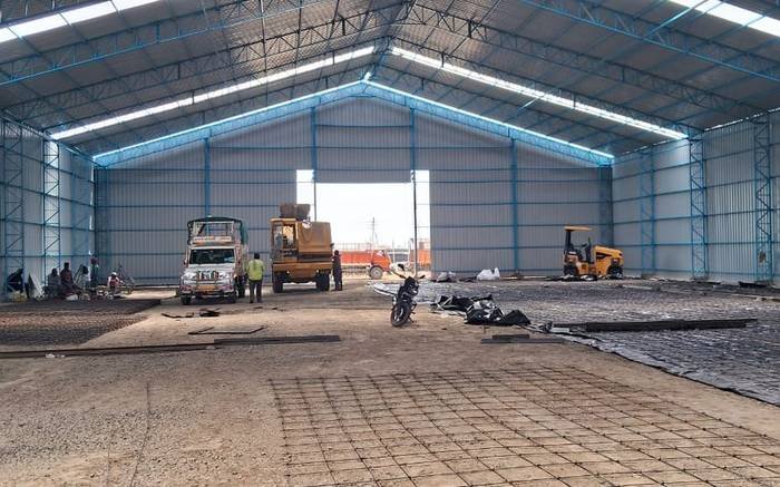 Mild-steel truss frame of an industrial shed
