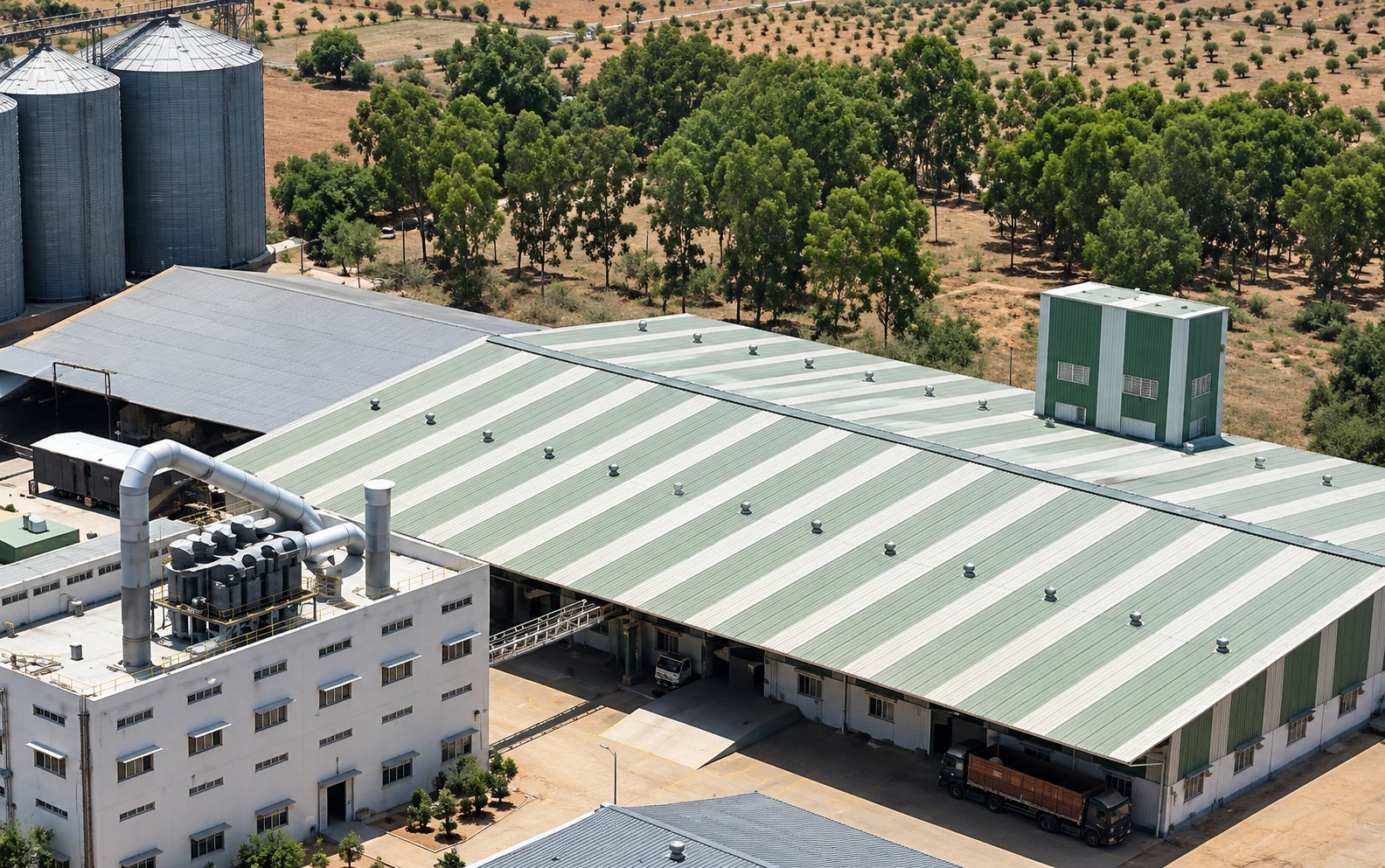 Tin sheet roofing across an industrial shed