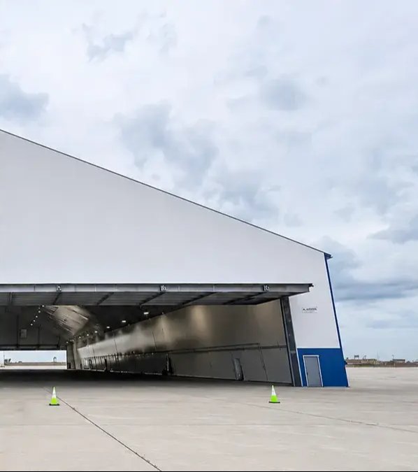 Completed wide-span shed structure on site