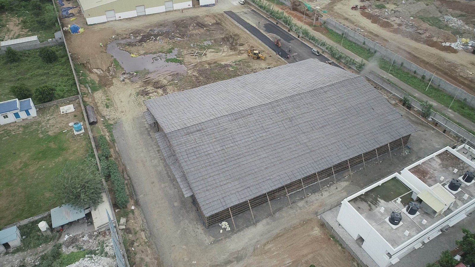 Pre-engineered building shed on a project site