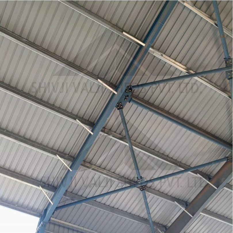 Close-up detail of the underside of a GI corrugated roof sheet with Z-purlins and bolted cross-bracing (detail shot, little context)